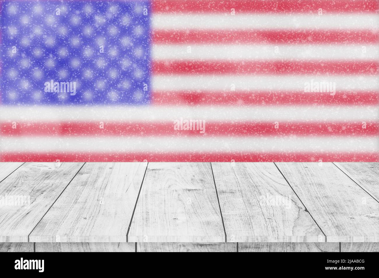 blur US American flag with snow glitter blink on wooden table top for products advertising background Stock Photo