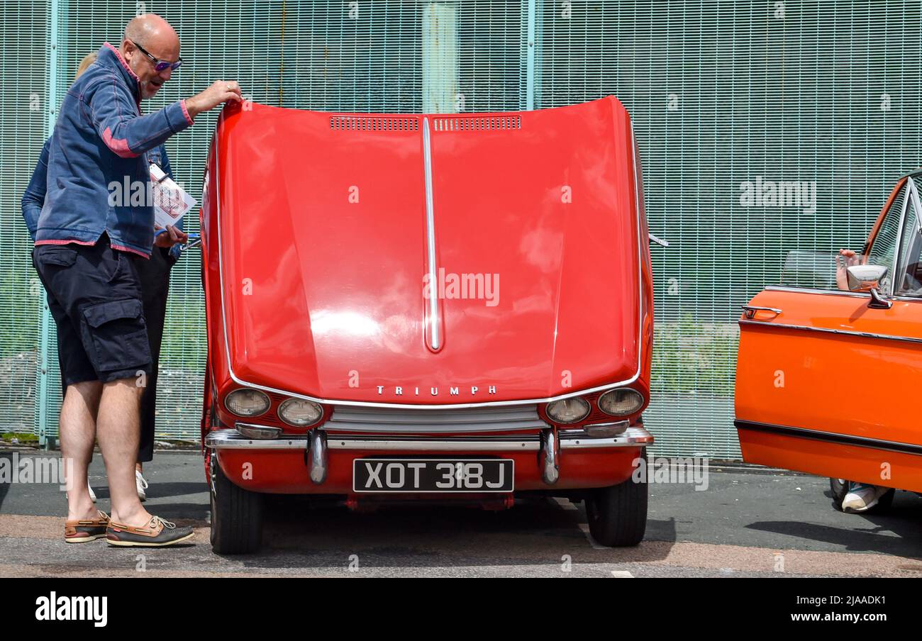 Brighton UK 29th May 2022 - Participants after completing  the London to Brighton Classic Car Run which finishes along Brighton seafront . The cars set off from the famous Brooklands Museum and production vehicles over 40 years old are eligible to take part  : Credit Simon Dack / Alamy Live News Stock Photo