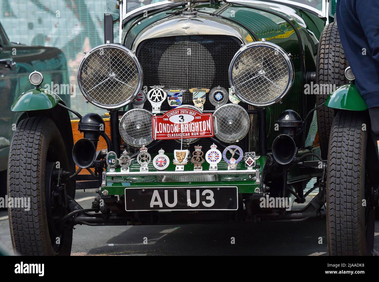 Brighton UK 29th May 2022 - Participants after completing  the London to Brighton Classic Car Run which finishes along Brighton seafront . The cars set off from the famous Brooklands Museum and production vehicles over 40 years old are eligible to take part  : Credit Simon Dack / Alamy Live News Stock Photo