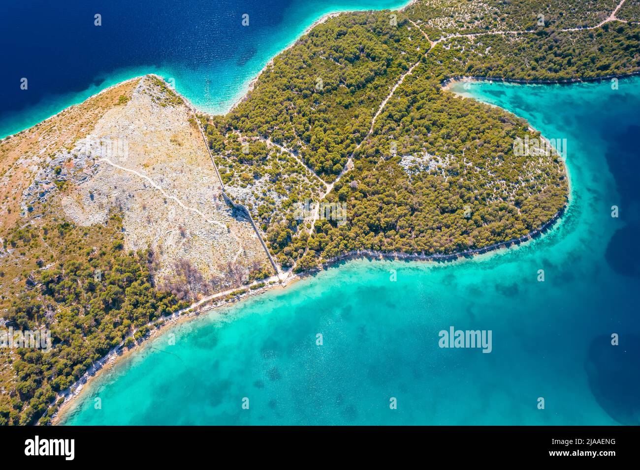 Grebastica turquoise bay and Ostrica historic defence wall ruins aerial view, Dalmatia archipelago of Croatia Stock Photo