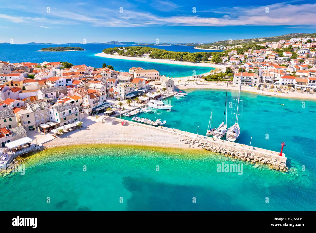 Adriatic tourist town of Primosten turquoise beach and seafront aerial view, Adriatic sea, Dalmatia region of Croatia Stock Photo