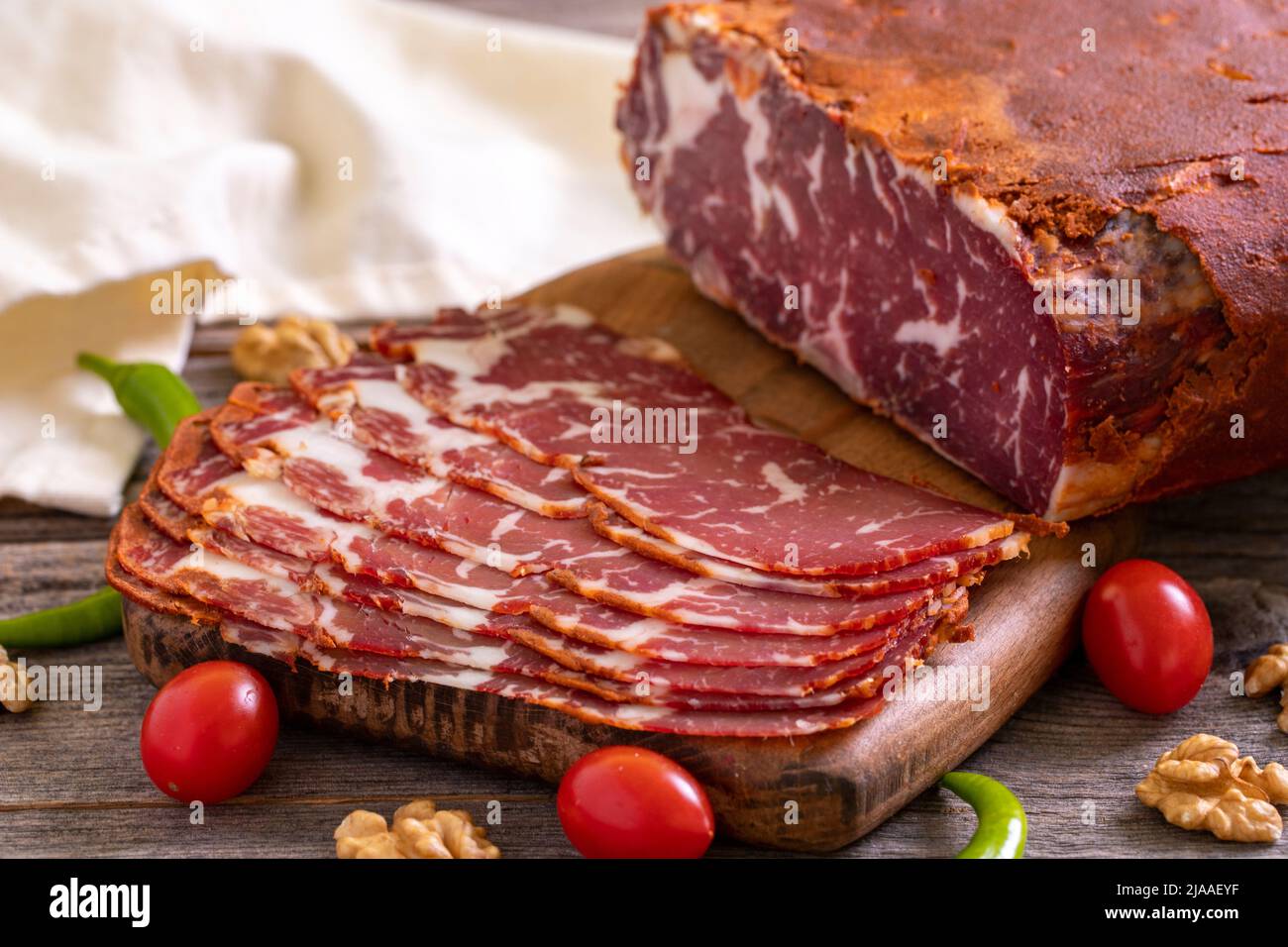 Turkish pastrami. Bacon made from ribeye meat. Beef pastrami sliced