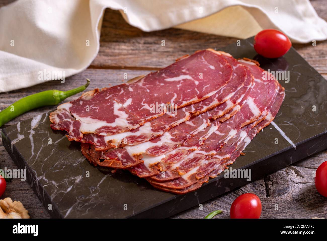 Turkish pastrami. Bacon made from ribeye meat. Beef pastrami sliced