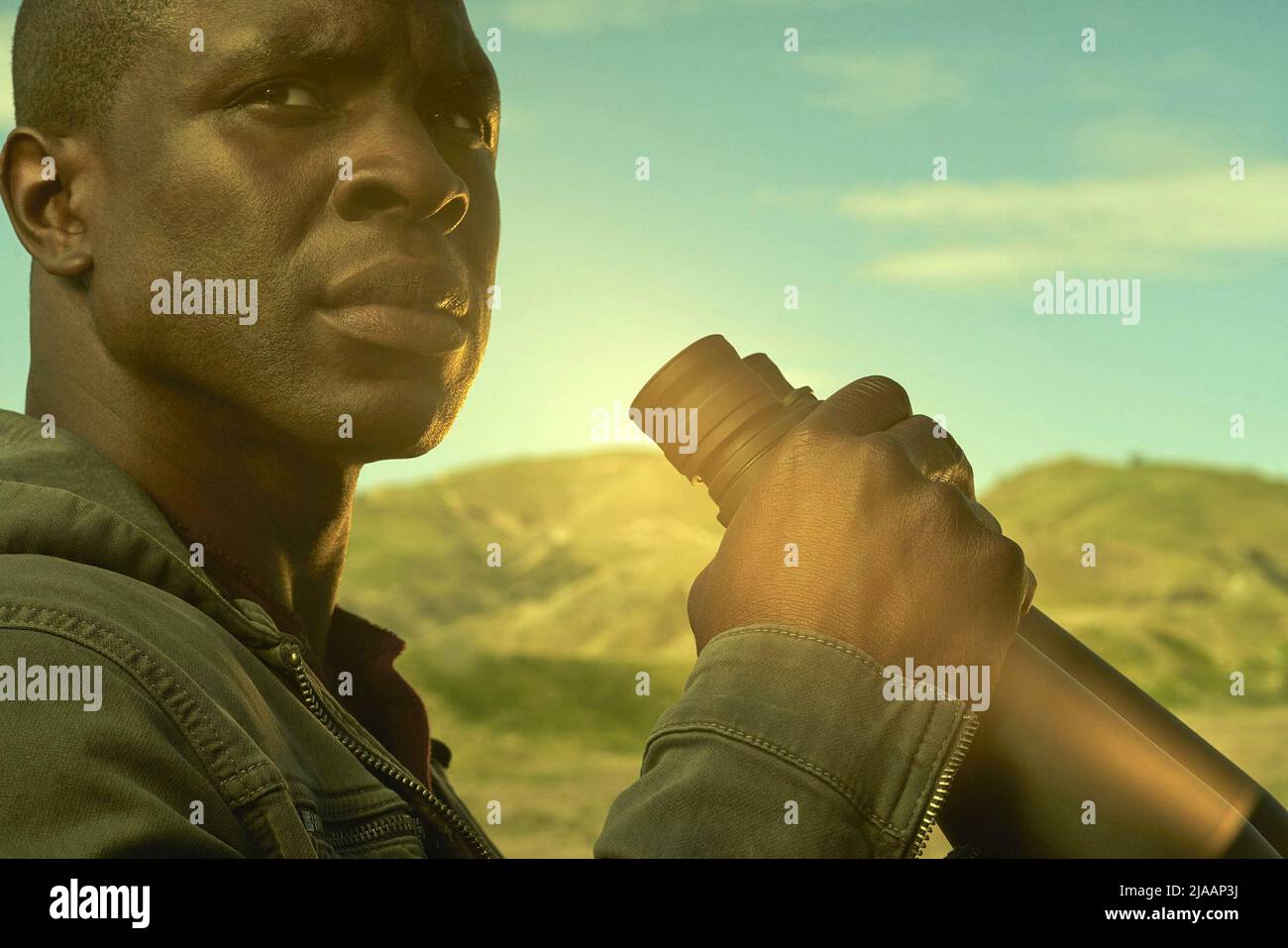 GBENGA AKINNAGBE in THE OLD MAN (2022), directed by JET WILKINSON, ZETNA FUENTES and JON WATTS. Credit: Fox 21 Television Studios / Album Stock Photo