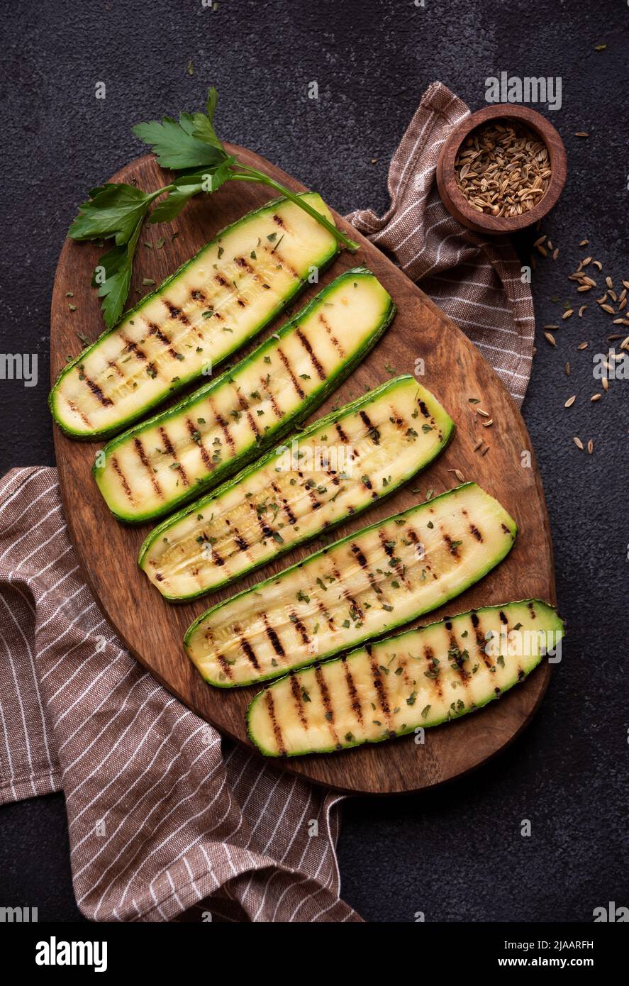 Grilled zucchini with some parsley, healthy diet food Stock Photo Alamy