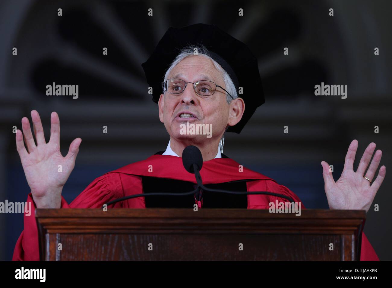U.S. Attorney General Merrick Garland speaks during Commencement Exercises for the classes of 2020 and 2021, which were originally not held in person because of the coronavirus disease (COVID-19) pandemic, in Cambridge, Massachusetts, U.S., May 29, 2022.   REUTERS/Brian Snyder Stock Photo