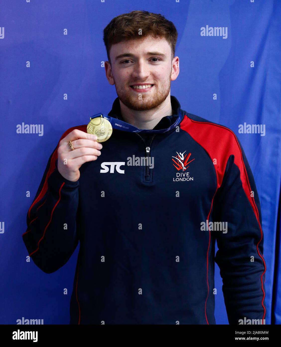 Dive London Aquatics Club’s Matty Matty Lee poses with his gold medal