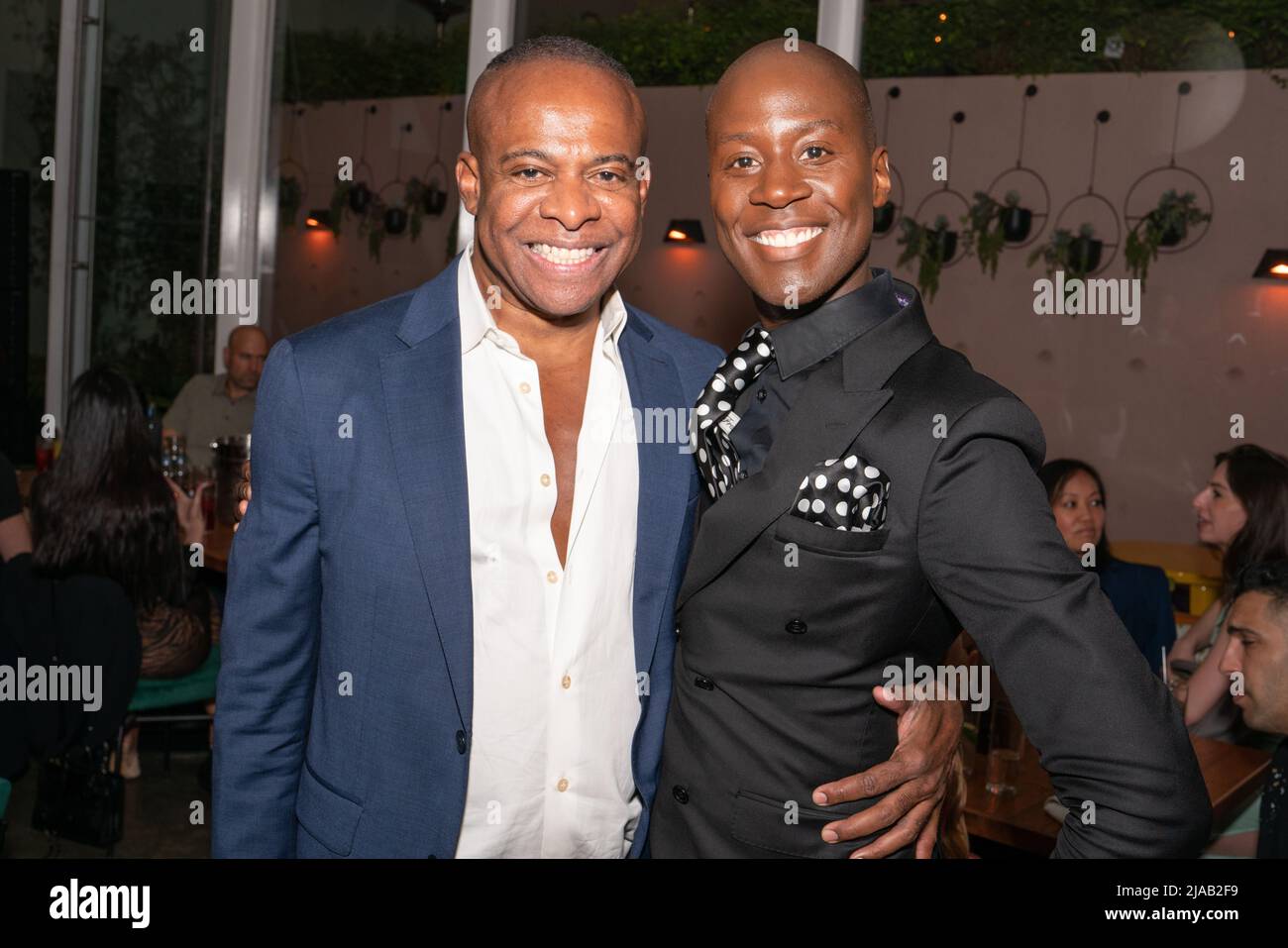 Frederick Anderson and Charlii Sebunya attend the Frederick Anderson