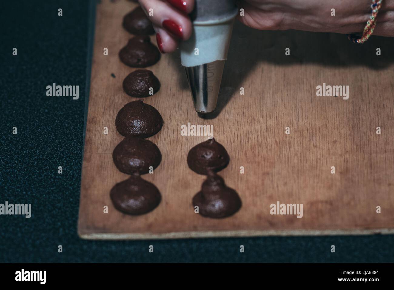Chocolate making process with a pastry case Stock Photo Alamy