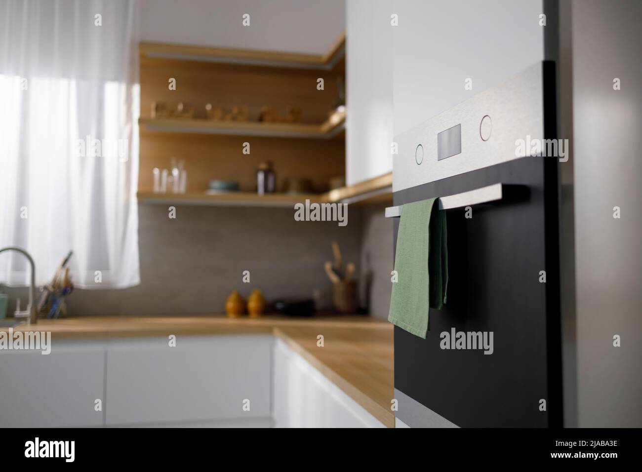 Modern kitchen interior with built-in oven Stock Photo