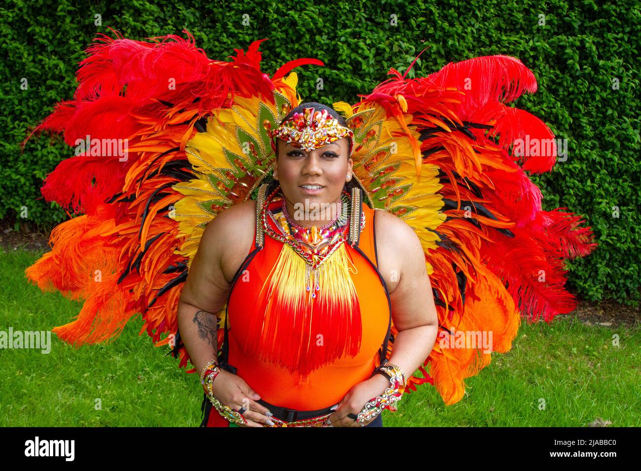 Pareesha Webster at  Preston’s 48th Caribbean Carnival - a spectacular exhibition of African and Caribbean culture. Exotic, bright designs, tropical extravagant, multi-coloured saturated, colourful carnival costumes. One of Preston's most thrilling yearly events, with a procession through the city centre streets.The event kicked out with a stunning parade, which featured strange, lavish, brightly coloured apparel, fantastic costumes, dancing, and groovy bands in a street extravaganza. Stock Photo