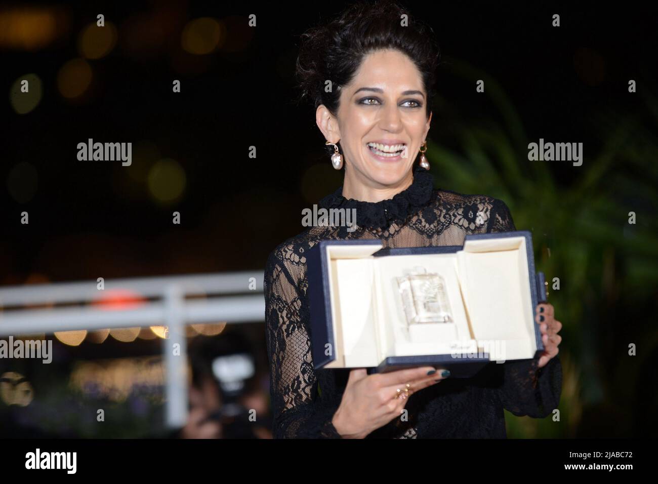 May 28, 2022, CANNES, France: CANNES, FRANCE - MAY 28: Zahra Amir Ebrahimi poses with the Best Actress Palme d'Or Award for the movie 'Holy Spider' during the winner photocall during the 75th annual Cannes film festival at Palais des Festivals on May 28, 2022 in Cannes, France (Credit Image: © Frederick Injimbert/ZUMA Press Wire) Stock Photo