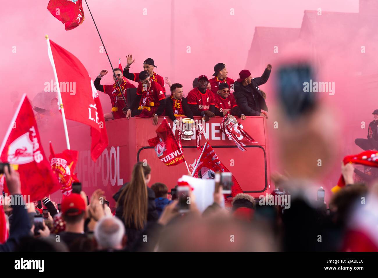 Liverpool, UK. 29th May 2022 - Despite last nights defeat at the Champions League Final, Liverpool Football Club take part in an open top bus parade to showcase the FA Cup and the Carabao Cup silverware won by the team earlier in the year. Credit: Christopher Middleton/Alamy Live News Stock Photo