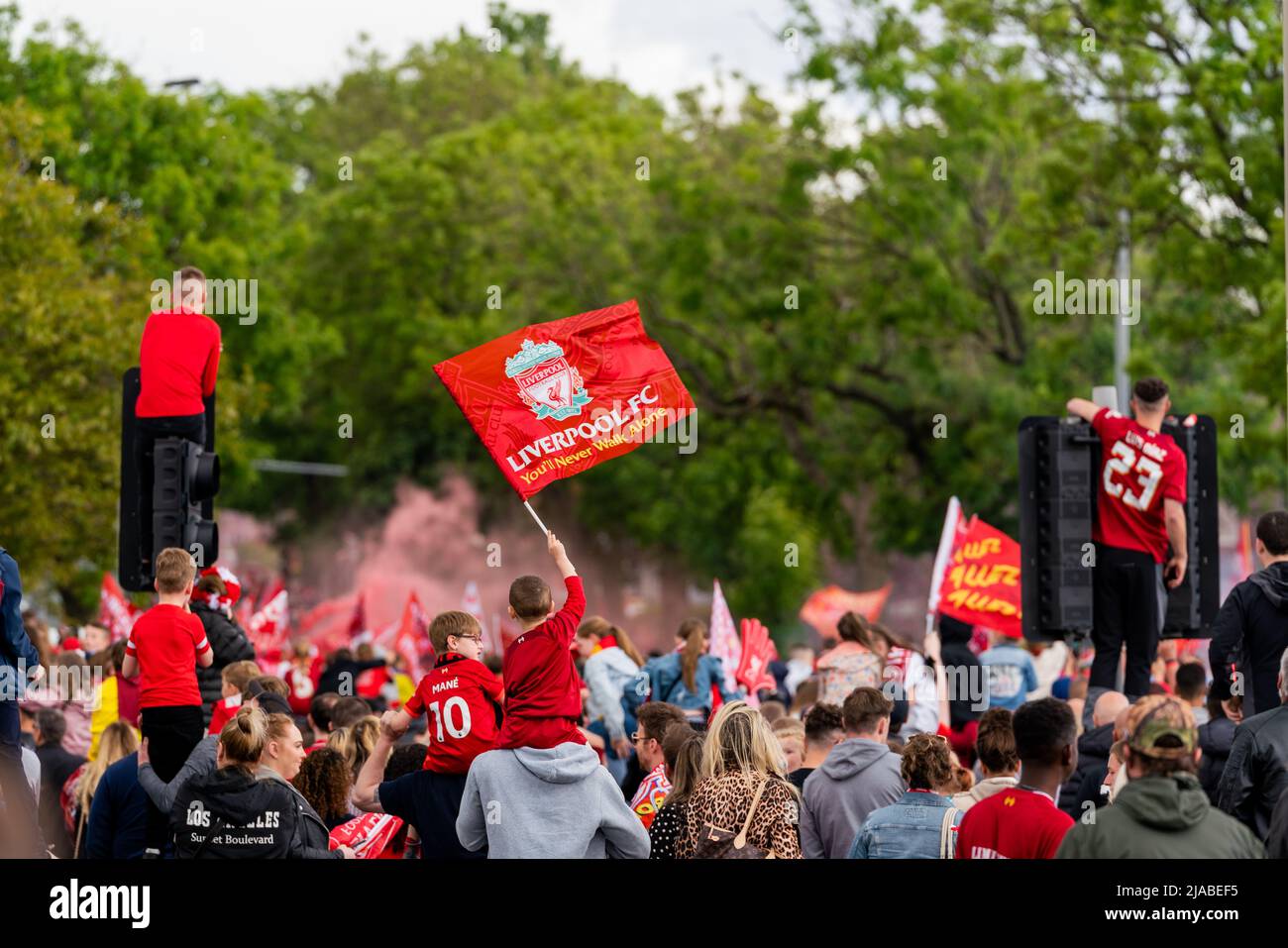 Liverpool, UK. 29th May 2022 - Despite last nights defeat at the Champions League Final, Liverpool Football Club take part in an open top bus parade to showcase the FA Cup and the Carabao Cup silverware won by the team earlier in the year. Credit: Christopher Middleton/Alamy Live News Stock Photo