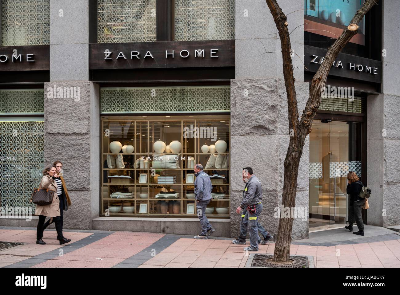 Madrid, Spain. 26th Mar, 2022. Pedestrians walk past the Spanish Inditex  group dedicated to the manufacturing of furniture and home textiles, Zara  Home, store in Spain. (Credit Image: © Xavi Lopez/SOPA Images