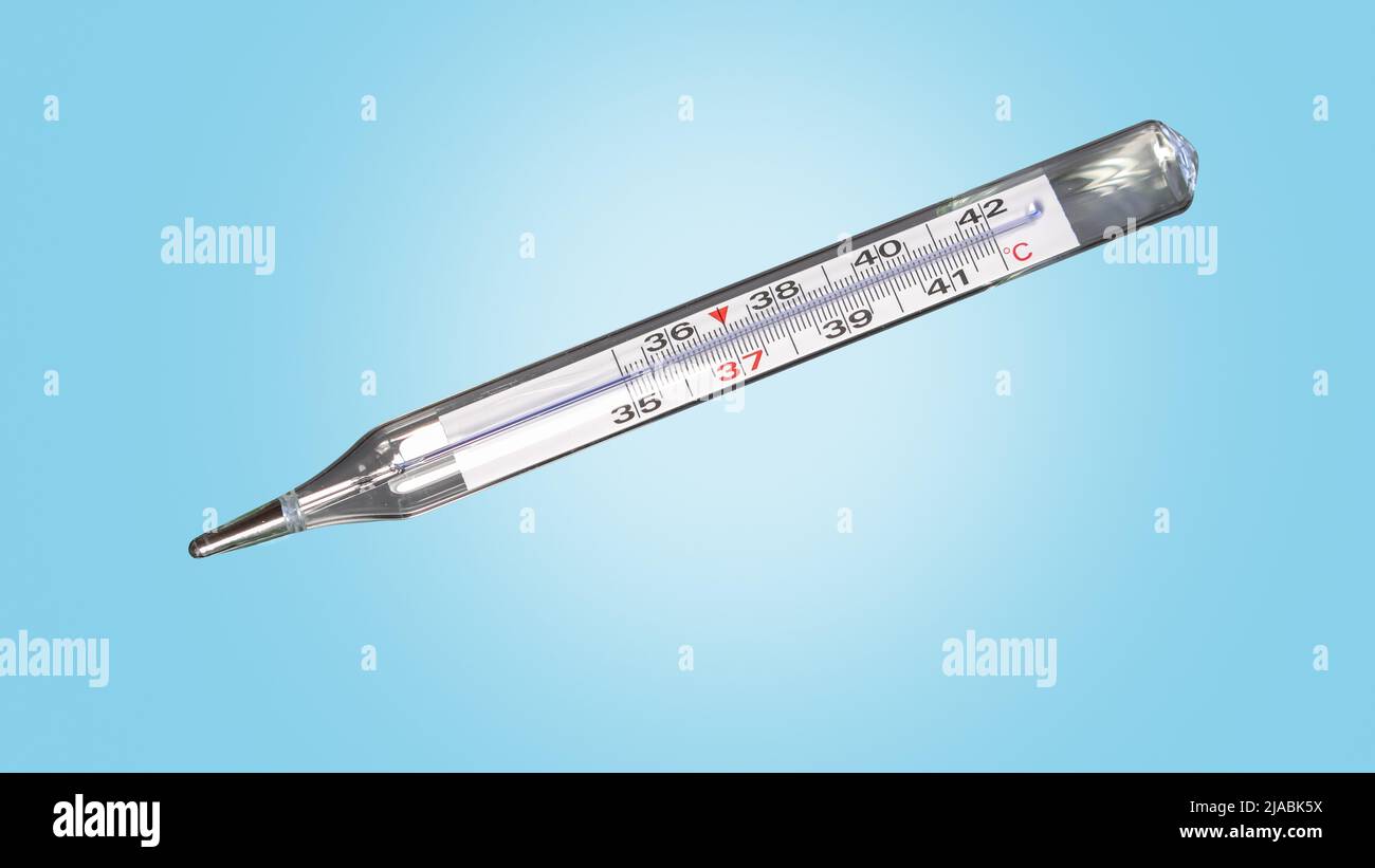 Analog clinical thermometer, mercury free, calibrated in degrees centigrade indicating a temperature of 38.5 degrees centigrade. Fever or illness conc Stock Photo