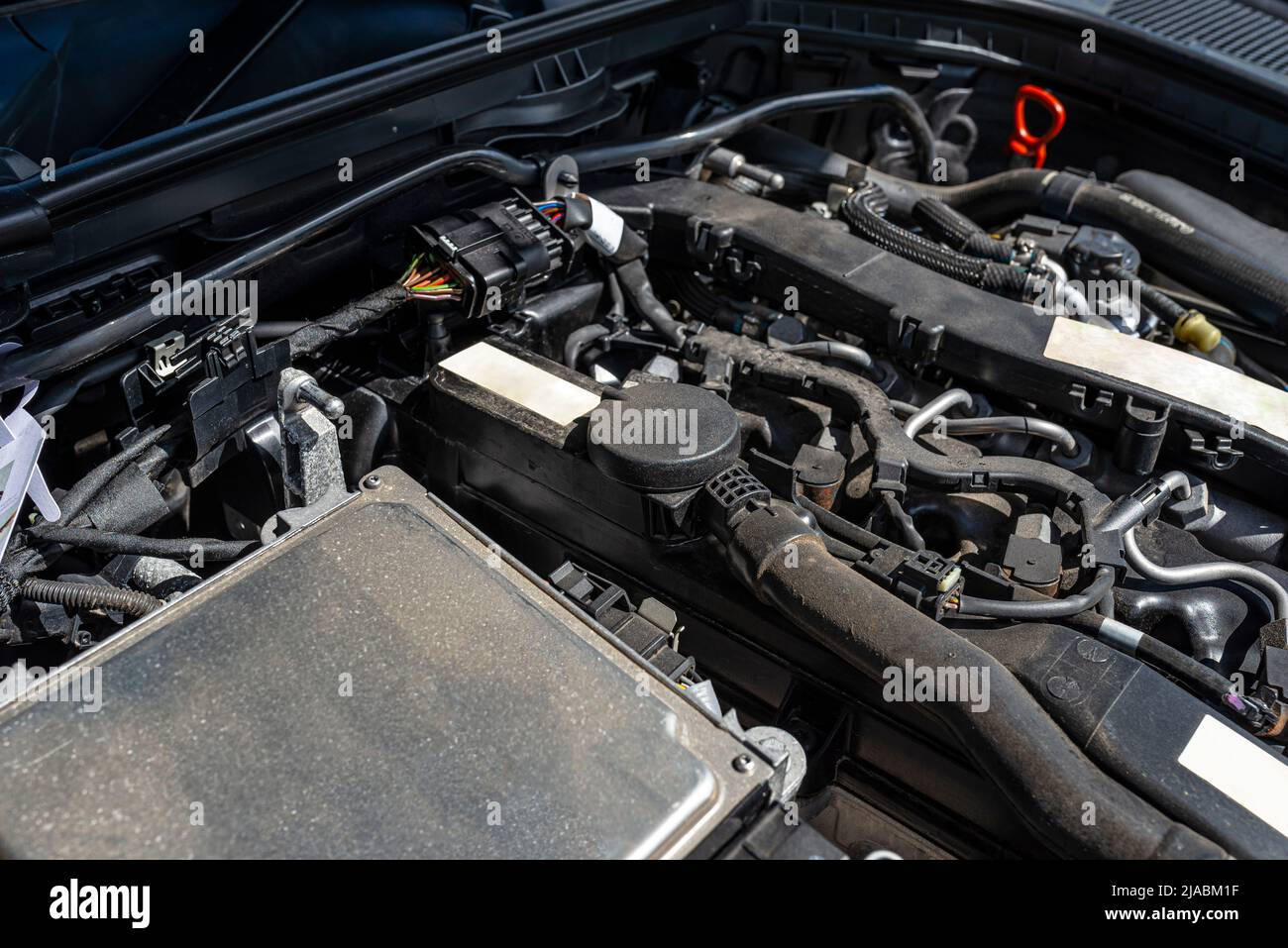 A modern diesel engine with 170 horsepower and an engine capacity of 2.2 liters. Visible engine equipment, spark plugs and electric wires. Stock Photo