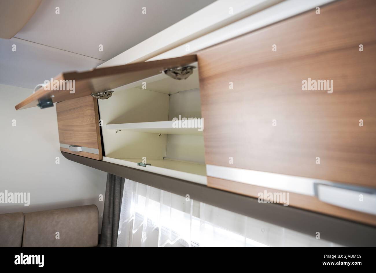 Elegant Camper Van Overhead Storage Area. Modern Motorhome RV