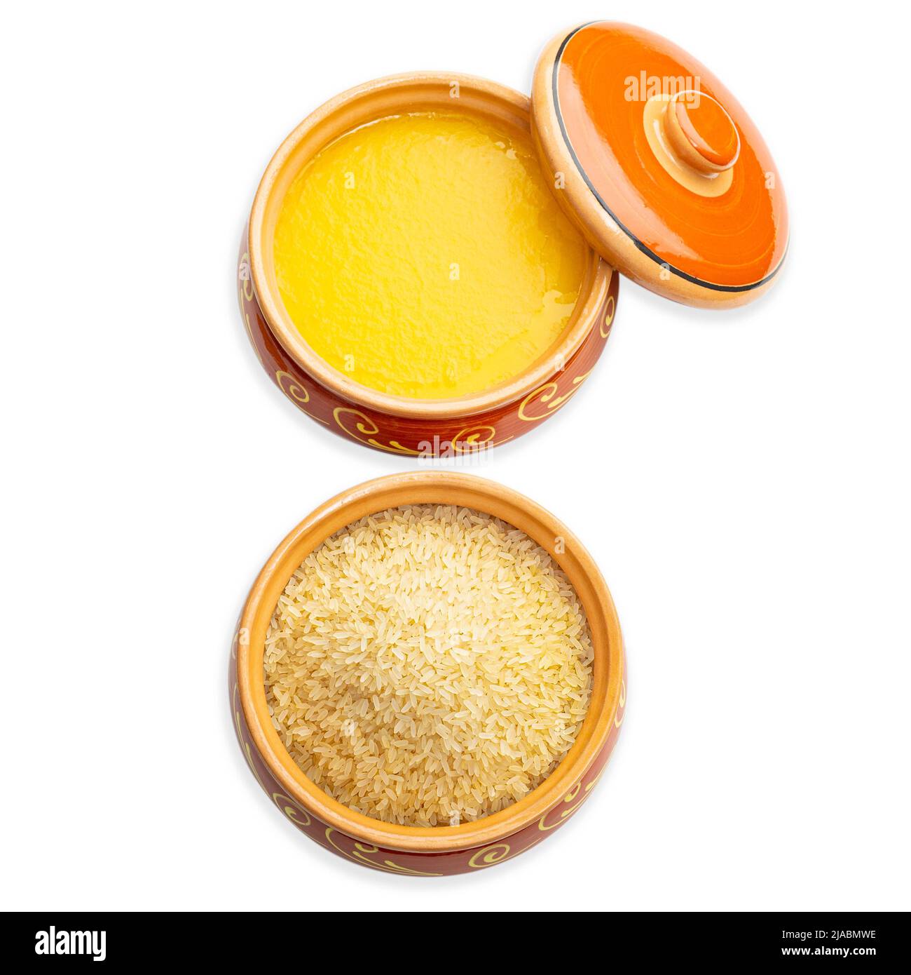 Homemade ghee and rice in a ceramic pot. Isolated white background. Top