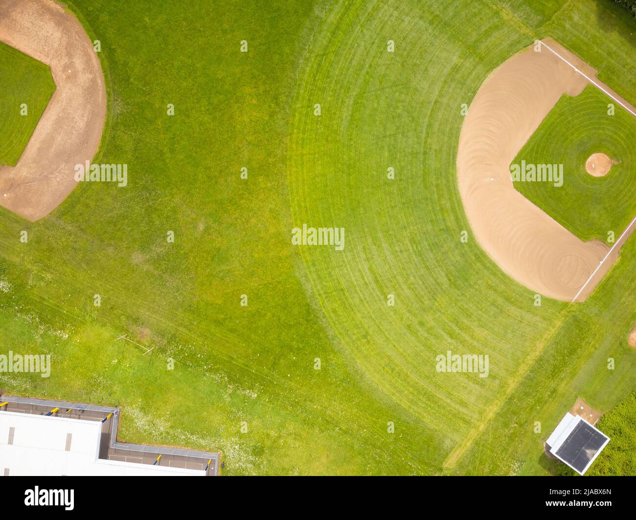 View from above. Green sports ground with markings. Sports games, training, championships, matches. Professional and amateur sports, healthy lifestyle Stock Photo
