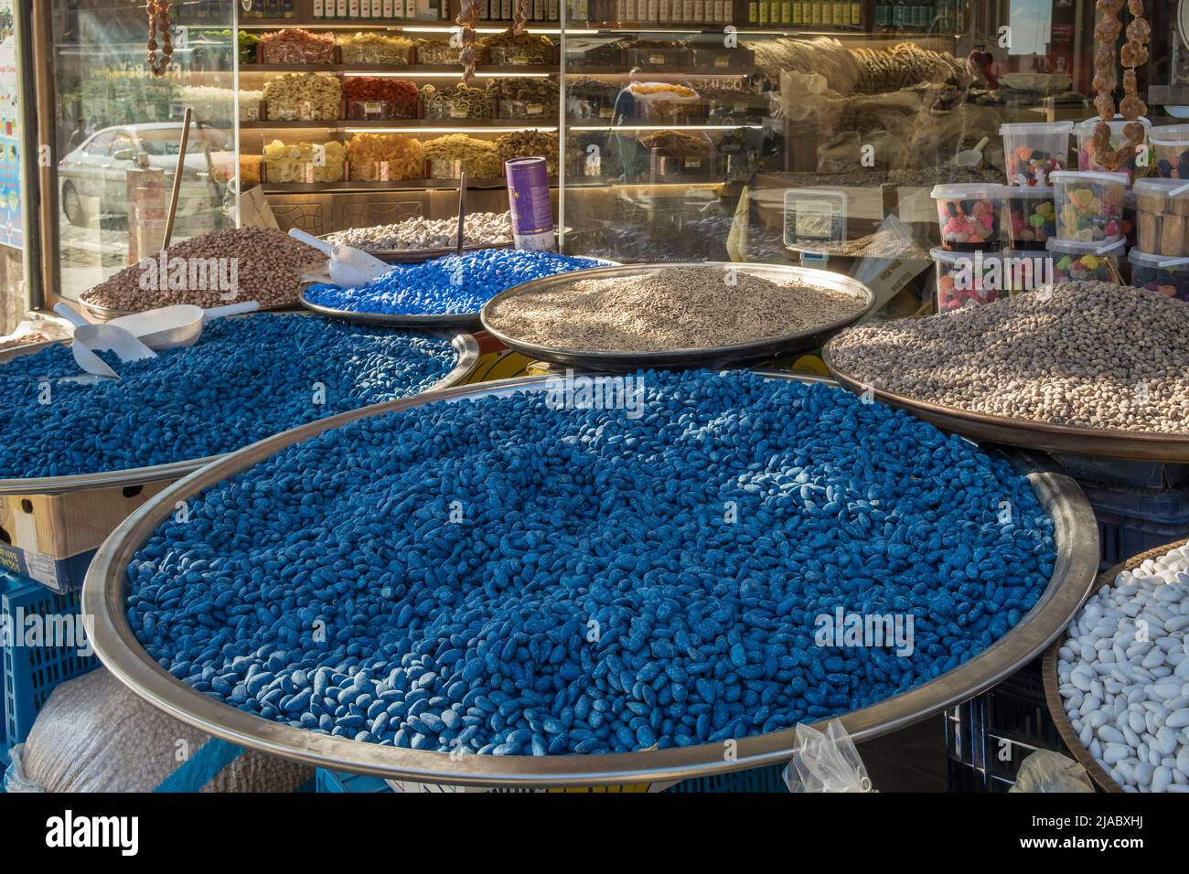 Almonds covered with a sweet blue icing for sale in Mardin town, Turkey. Stock Photo