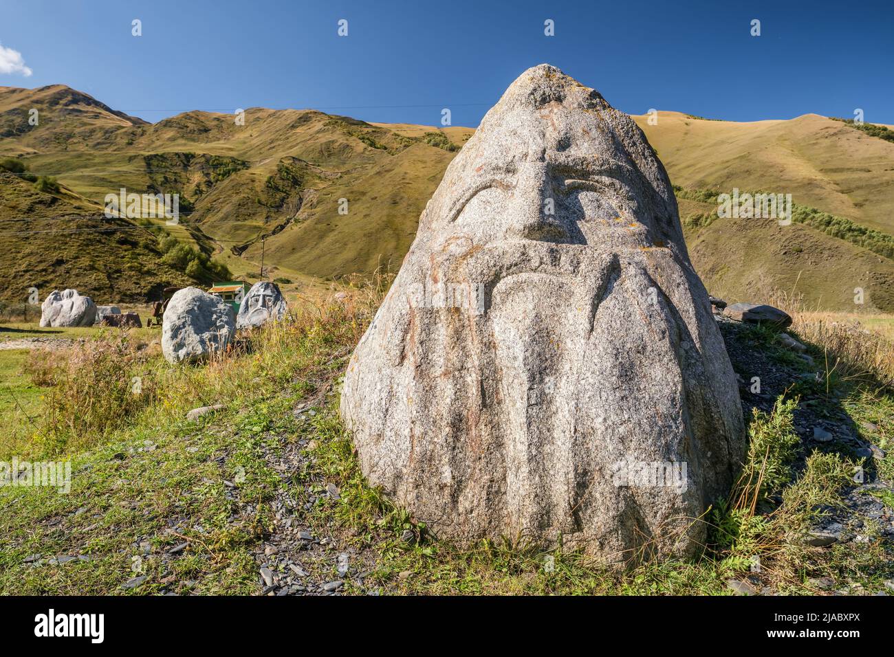 Stone Faces sculptures in the Sno village in Caucasus mountains, Georgia Stock Photo