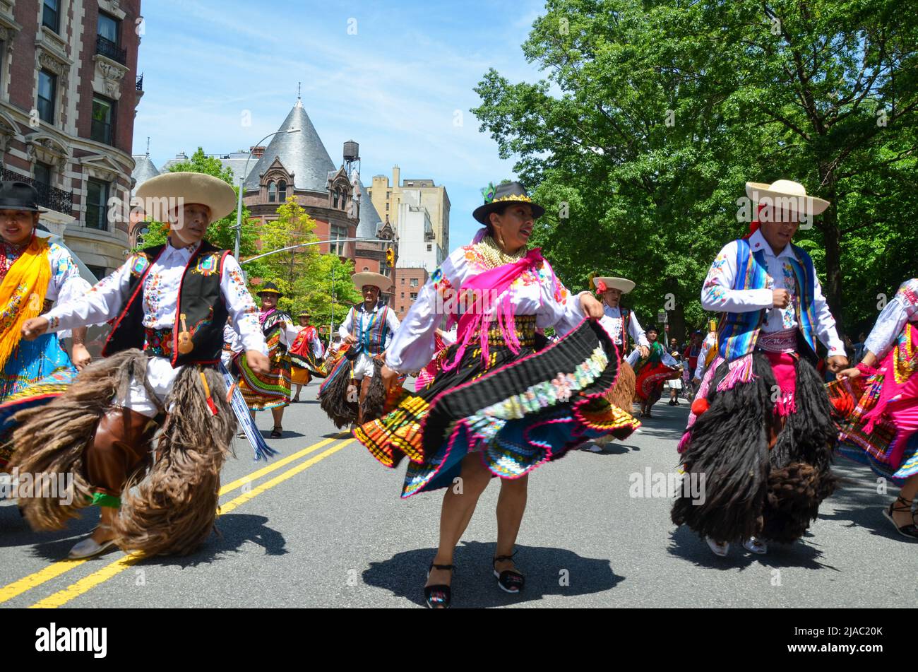 Participants march way up Central Park West in New York City during the annual  Ecuadorian Independence Day Parade on May 29, 2022. Stock Photo