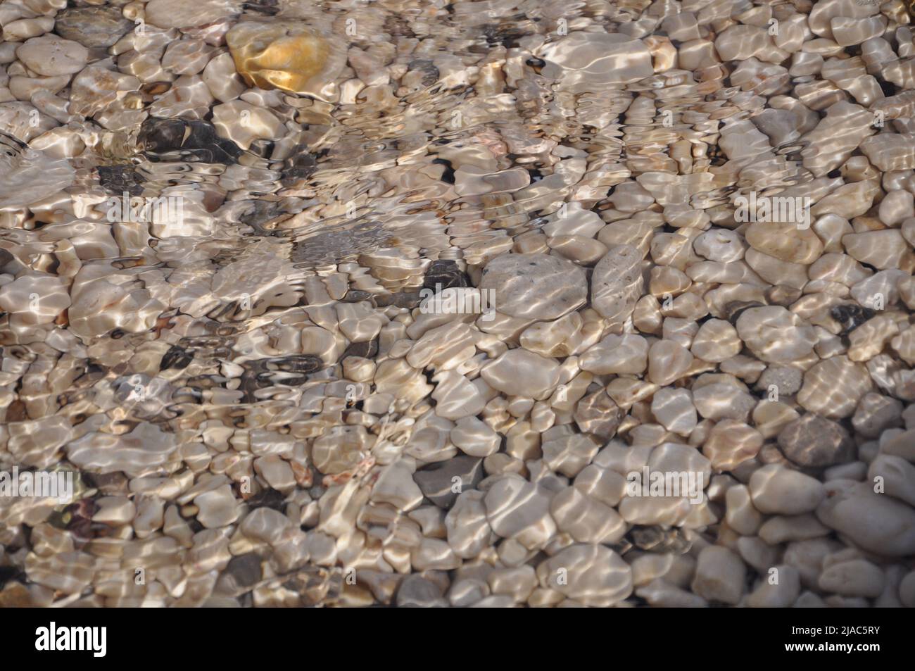 Under water pebble texture/ backgrounds. pebble underwater texture Stock Photo