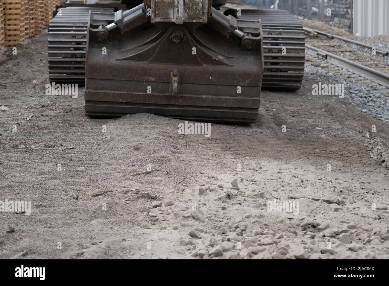 Excavator digging at contruction site for a new building Stock Photo