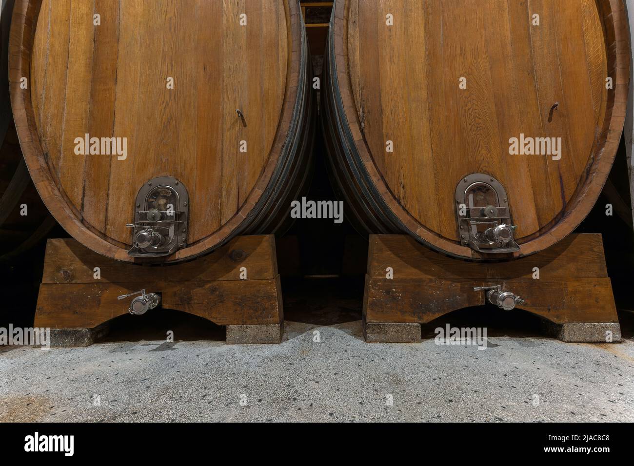 Old oak barrel rows in an authentic wine cellar of the french traditional winery Stock Photo Alamy