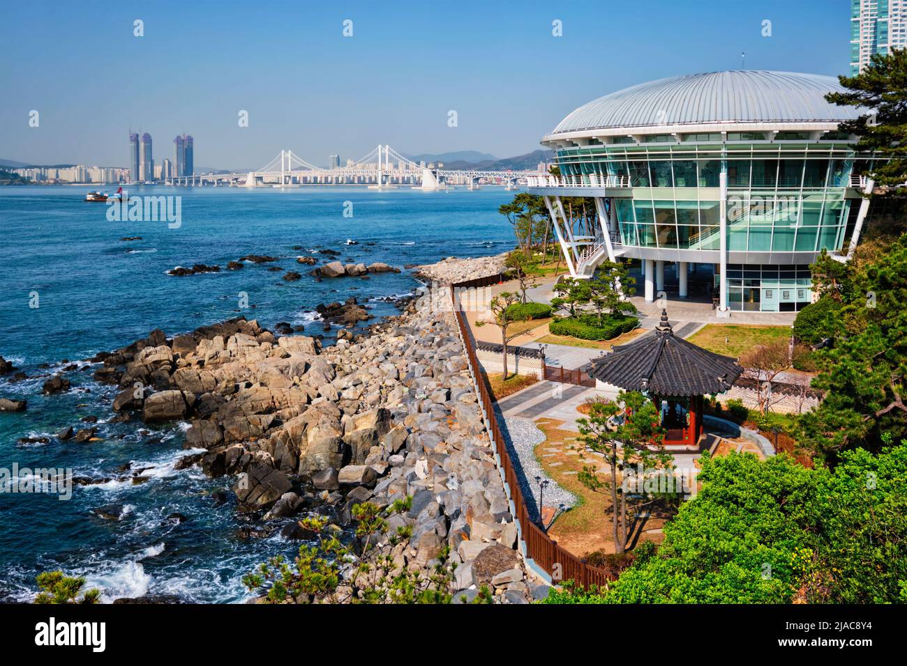 Nurimaru APEC House on Dongbaek island and Gwangan bridge in Busan, South Korea Stock Photo