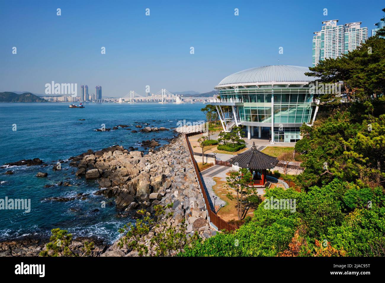 Nurimaru APEC House on Dongbaek island and Gwangan bridge in Busan, South Korea Stock Photo