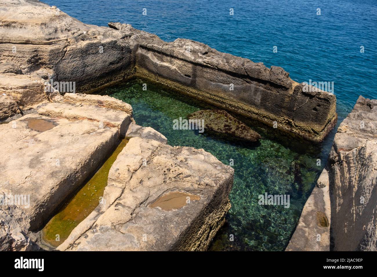 Swimming Pool Carved Into Rock, Valletta, Malta Stock Photo
