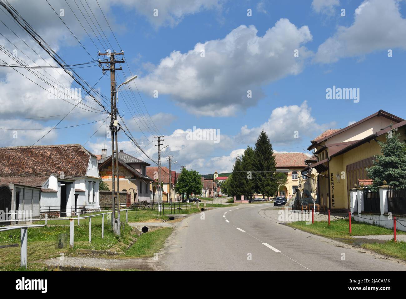 the Saxon village of Bradu (Gierelsau) near Sibiu, Transylvania, Romania: Main Road Stock Photo