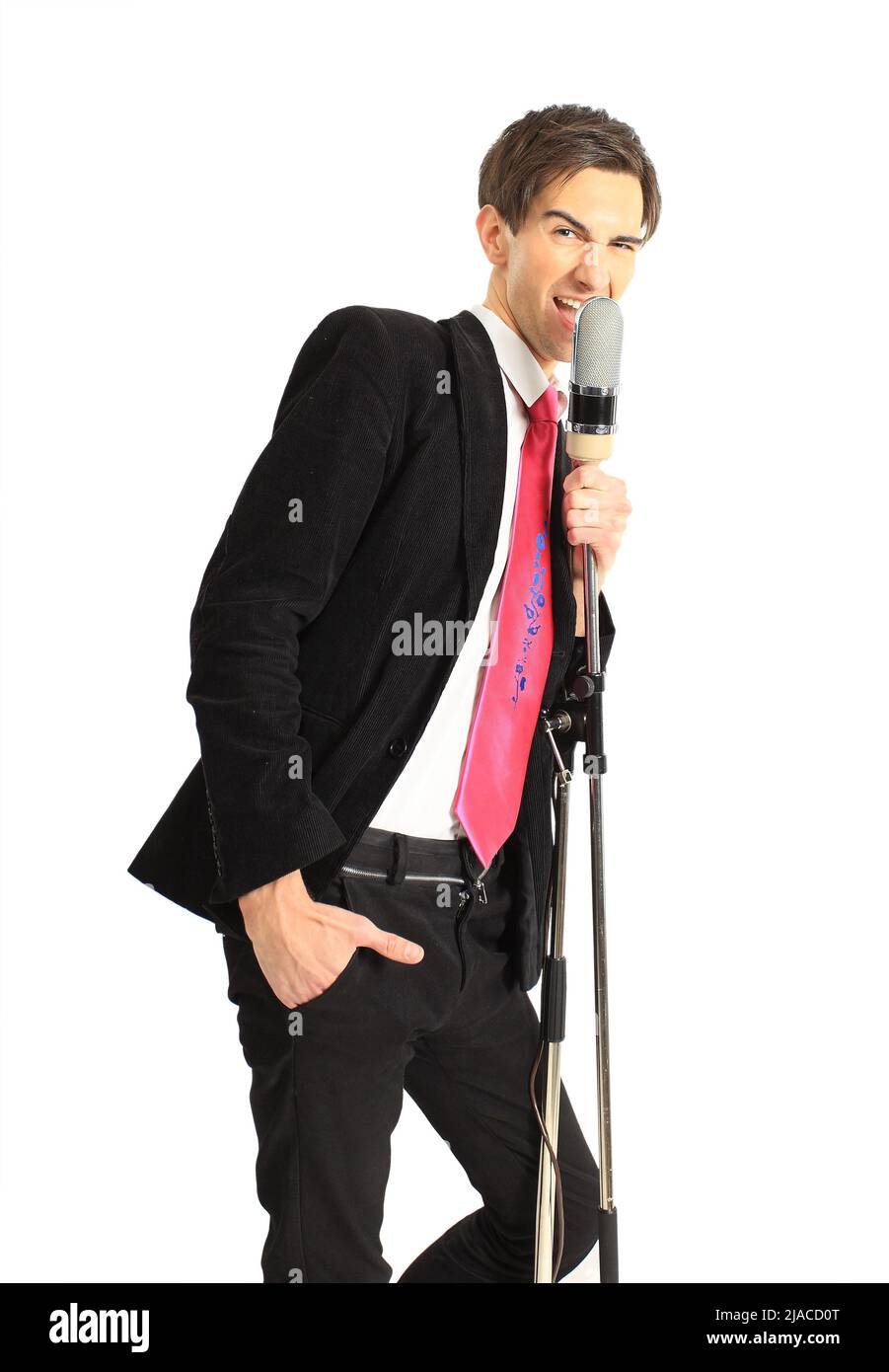 A Young Man Singing Into A Microphone On A White Background Stock Photo 