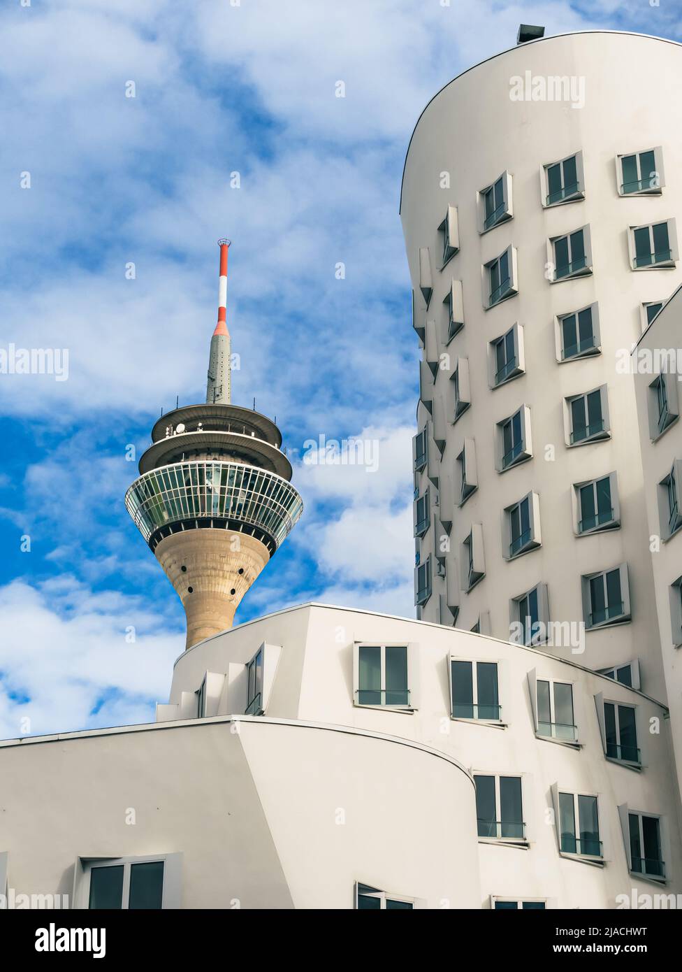 City office buildings with communications tower in background Stock Photo