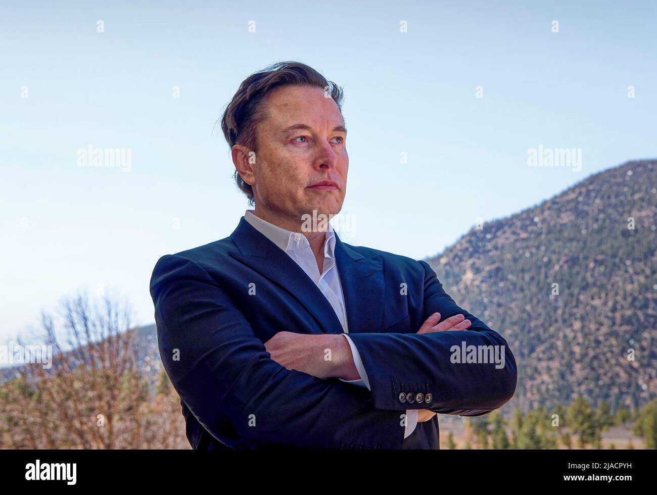 Elon Musk waits outside Arnold Hall before speaking to cadets on Thursday, April 7, 2022 at the United States Air Force Academy in Colorado Springs, El Paso County, CO, USA. Chief executive officer of electric vehicle manufacturer Tesla and space manufacturer SpaceX, Musk topped Forbes magazine's 2022 list of 'The World's Billionaires' with an estimated net worth of $219 billion, making him the world's wealthiest documented individual. (Apex MediaWire Photo by Trevor Cokley/U.S. Air Force) Stock Photo