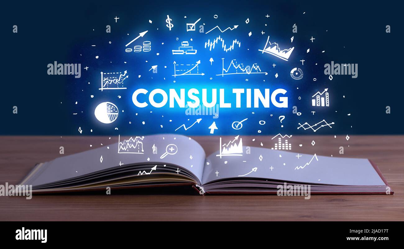Business inscription coming out from an open book Stock Photo - Alamy