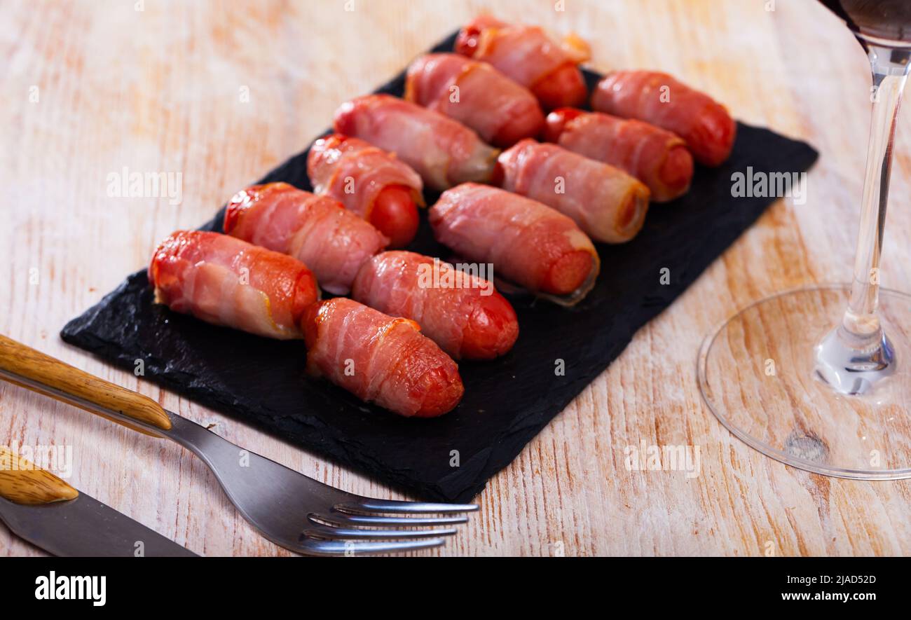 Bacon wrapped cocktail wieners Stock Photo Alamy
