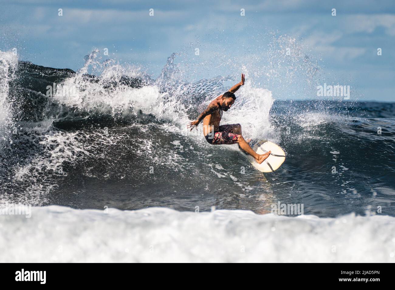 Man surfing in Atlantic ocean, Tenerife, Canary Islands, Spain Stock Photo