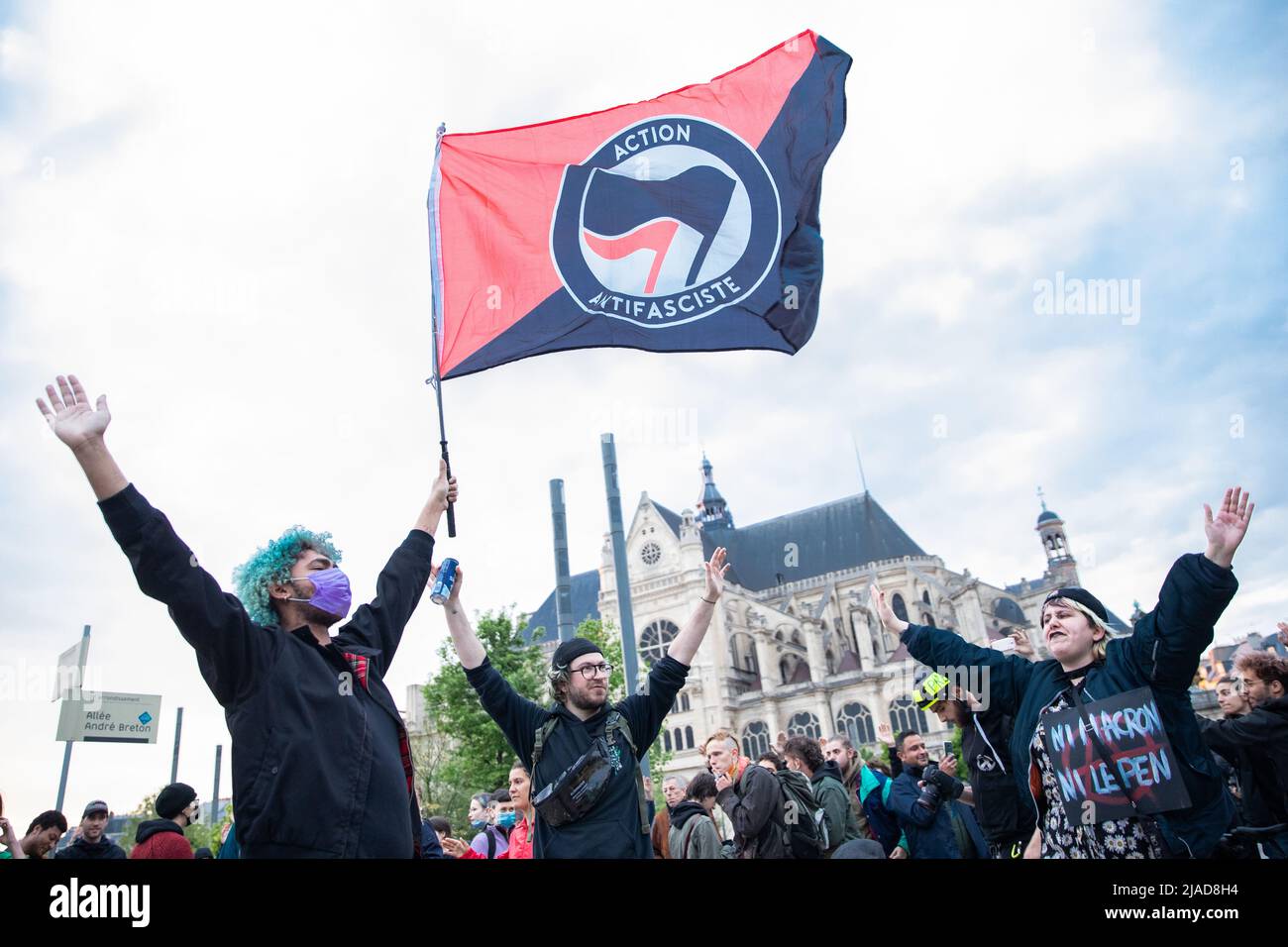 Protestors shout during a demonstration in Paris Stock Photo