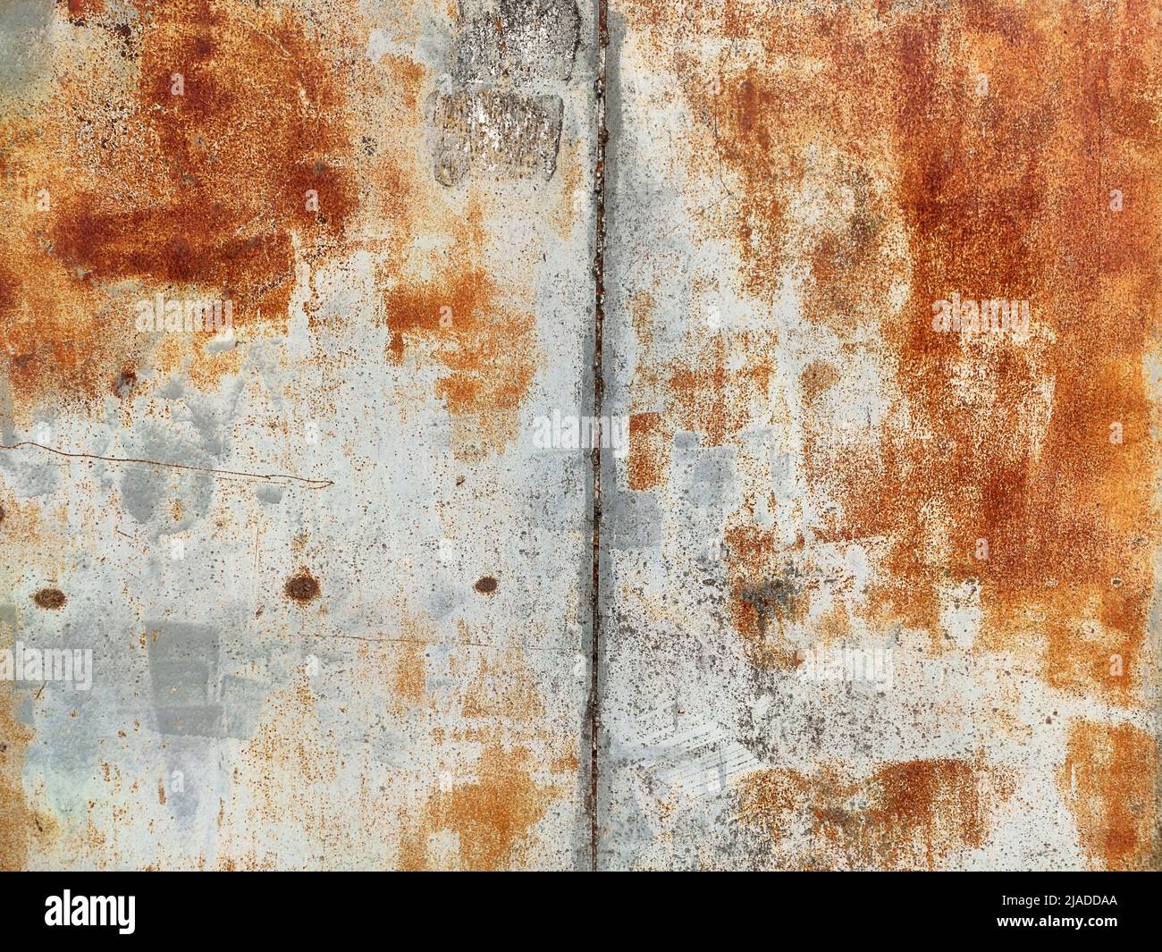 Rusty corrosion and oxidized background. Grunge rusted metal texture background. High resolution image of oxidized iron steel sheet wall. Stock Photo