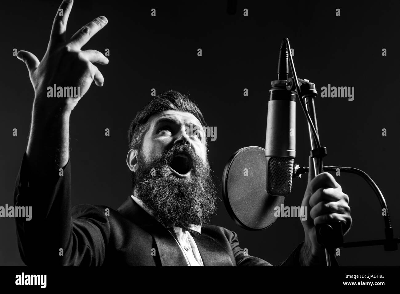 Man singing in recording studio Black and White Stock Photos & Images ...