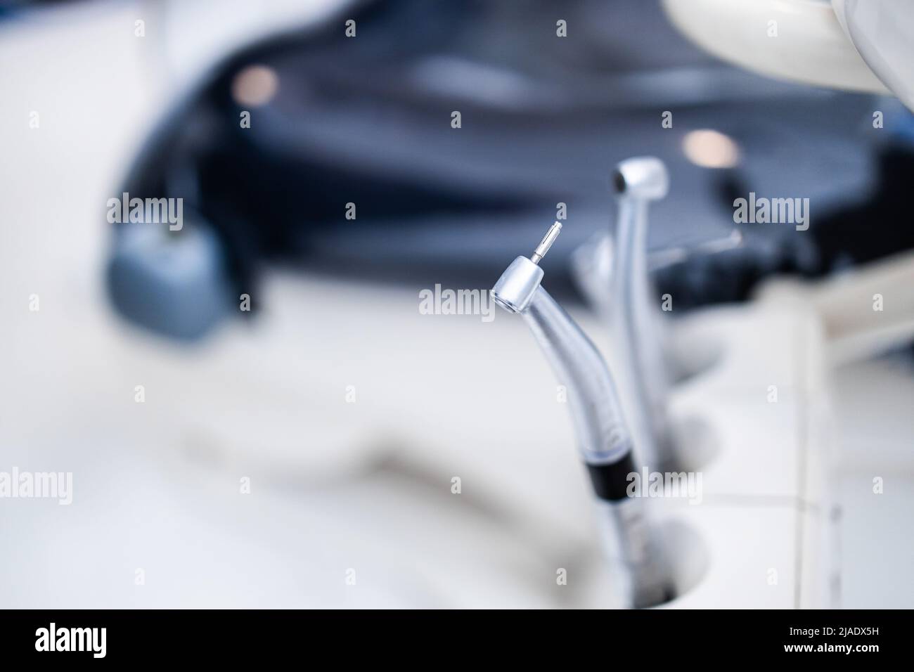 Dental instrument in stomatology clinic. Close up compressed nozzle air. Professional dentist tools. Selective focus. Stock Photo