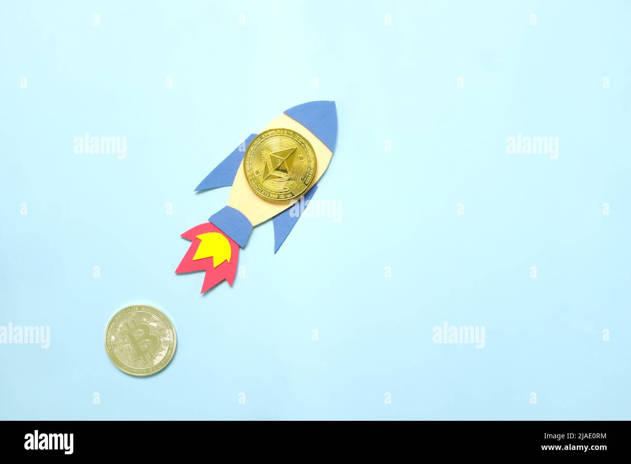 Ethereum coin surpass and overtake Bitcoin coin on rocket paper cutout with  copy space. Competition in cryptocurrency and Ethereum outperform Bitcoin  Stock Photo - Alamy