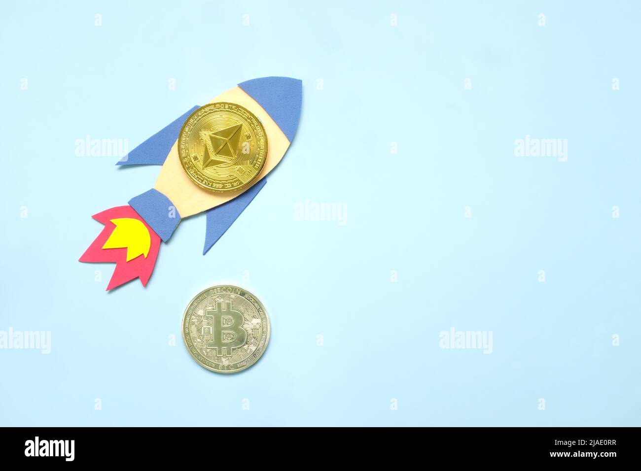 Ethereum coin surpass and overtake Bitcoin coin on rocket paper cutout with  copy space. Competition in cryptocurrency and Ethereum outperform Bitcoin  Stock Photo - Alamy