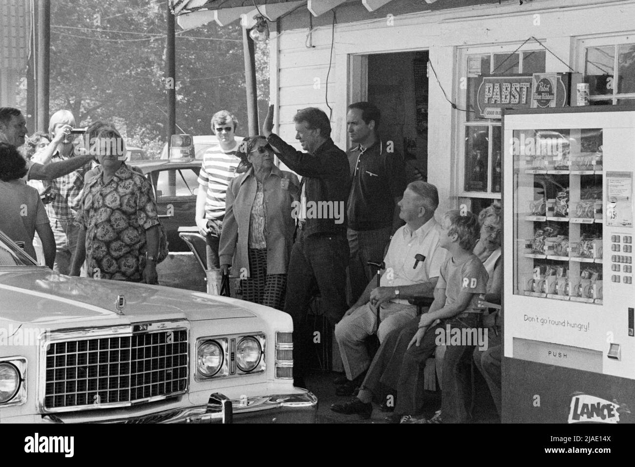 Jimmy Carter makes a campaign stop at his brother Billy's gas station in their hometown of Plains, Georgia. (USA) Stock Photo