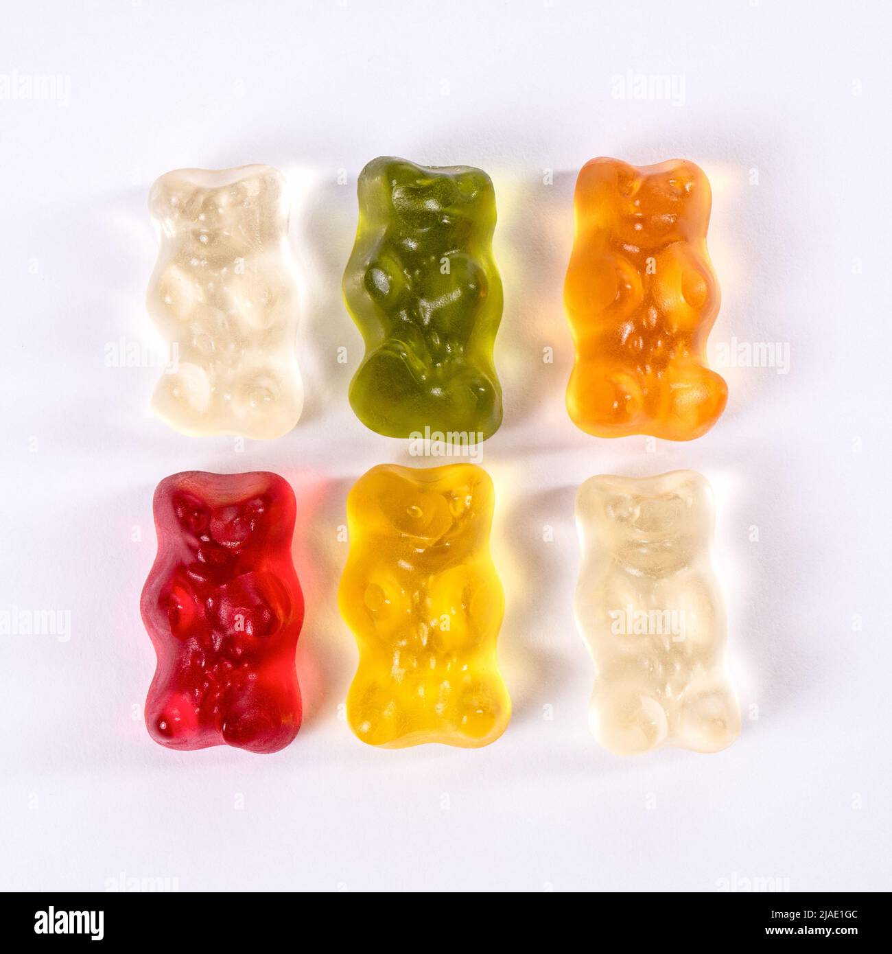 Gummy bears on a white background. Sweets and unhealthy food. Stock Photo