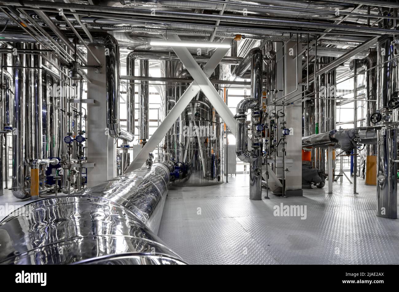 Container and pipelines at chemical nutrient additives plant Stock Photo