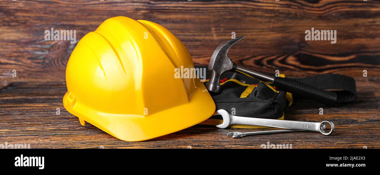 Set of construction tools on wooden background Stock Photo - Alamy